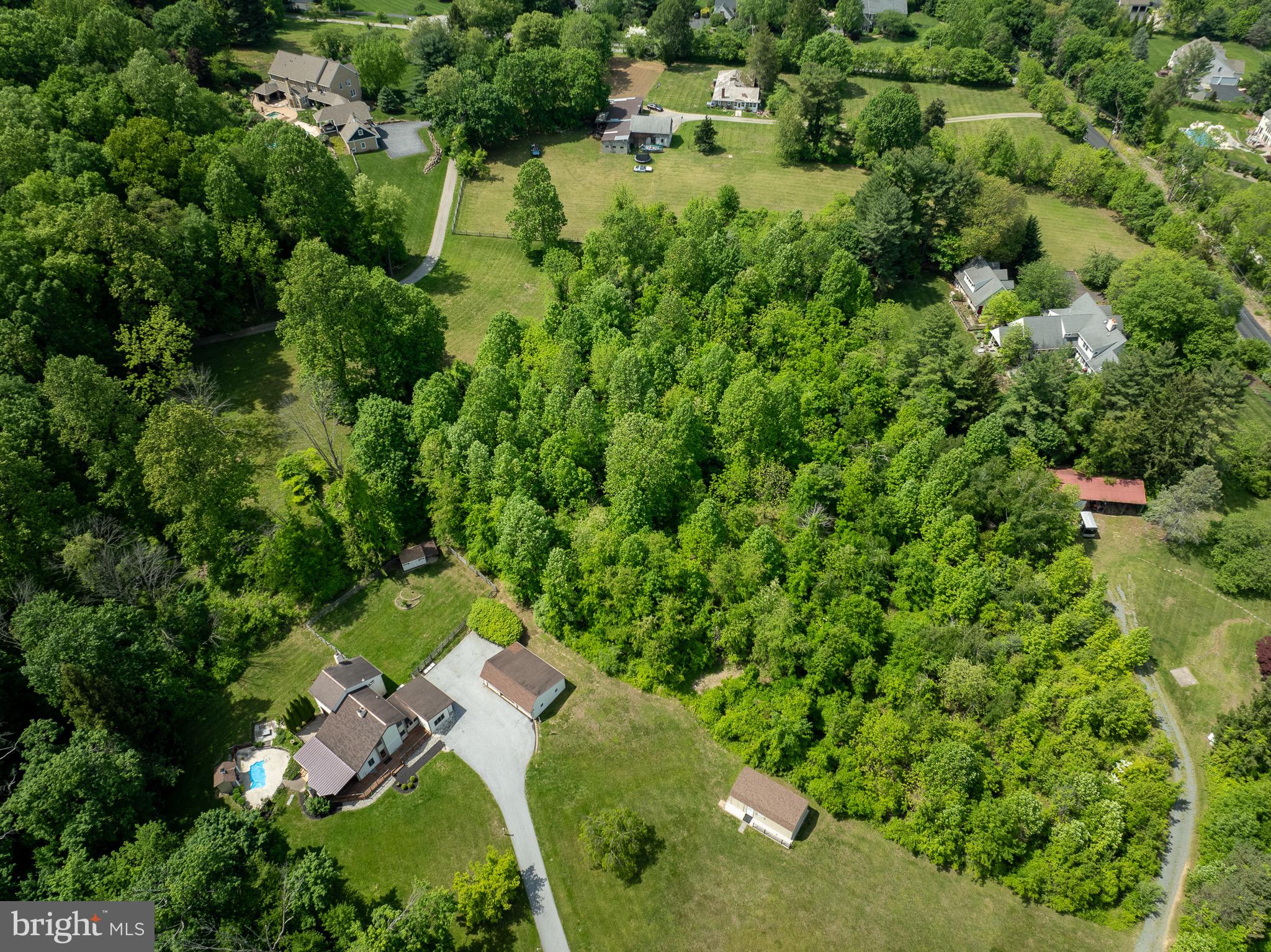 2290 Horseshoe Trail Chester Springs, PA 19425 - Photo 3 of 6 an aerial view of residential house with outdoor space and trees all around