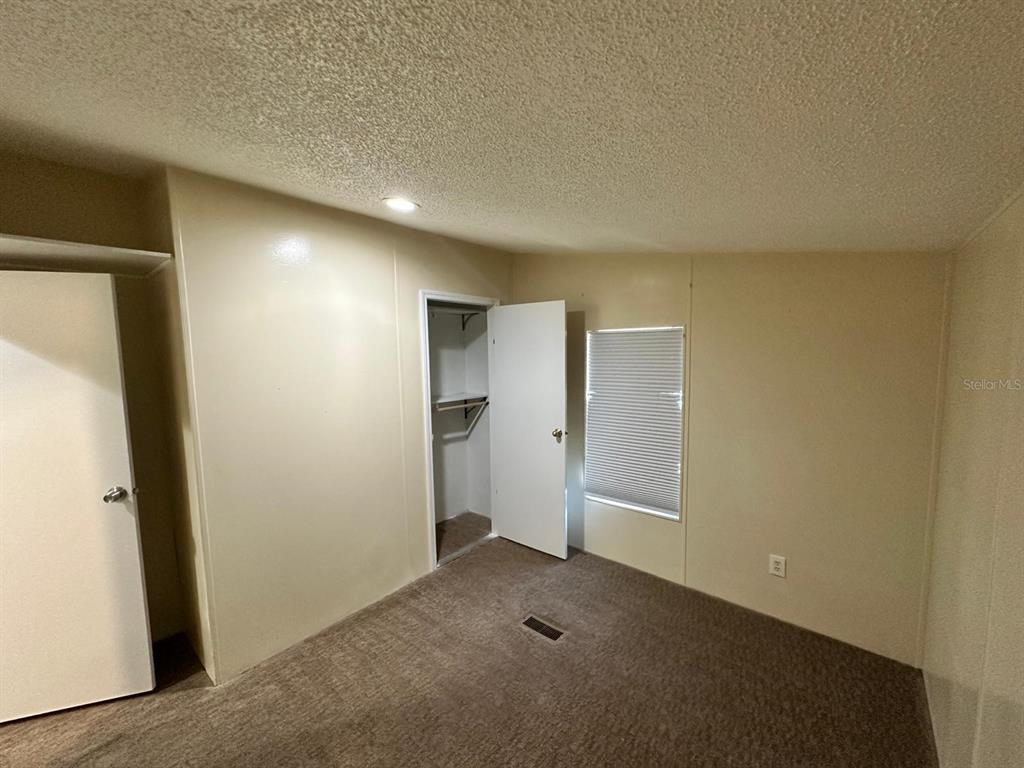 5920 Southwest 62nd Place Ocala, FL 34474 - Photo 9 of 20 a view of an empty room