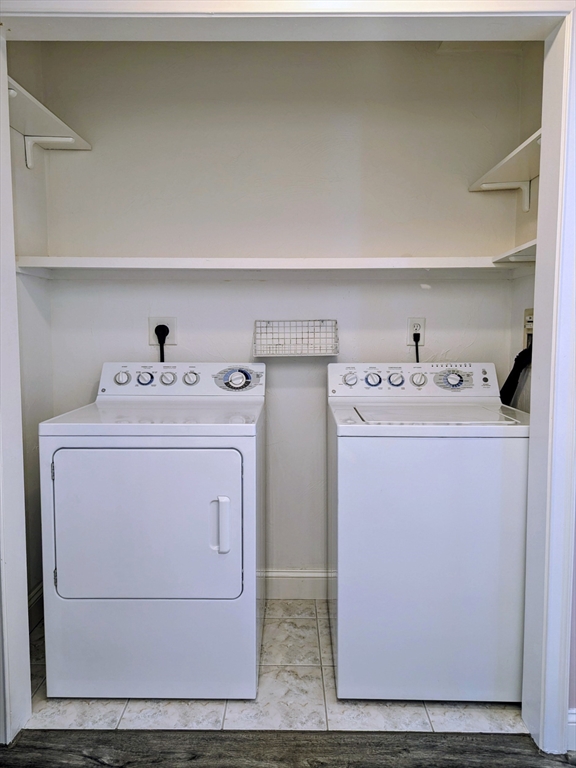 168 Humphrey Street, Unit 2 Swampscott, MA 01907 - Photo 15 of 26 a utility room with dryer and washer