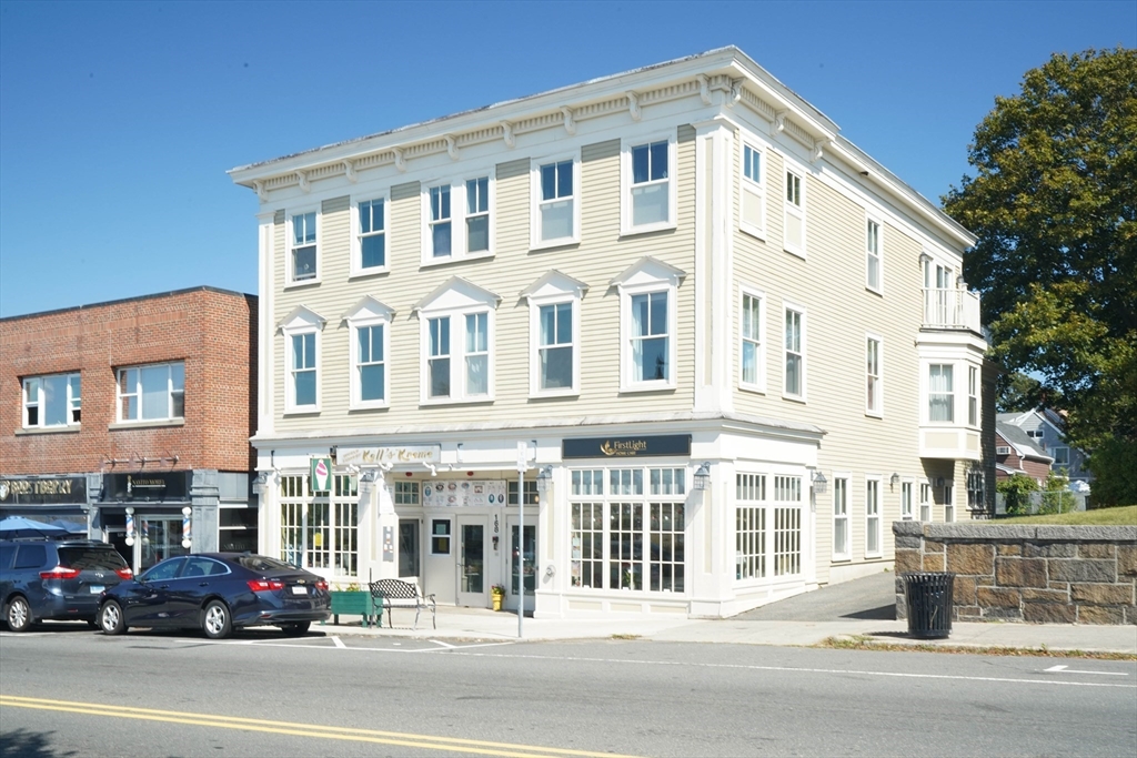 168 Humphrey Street, Unit 2 Swampscott, MA 01907 - Photo 22 of 26 a view of a building with a street