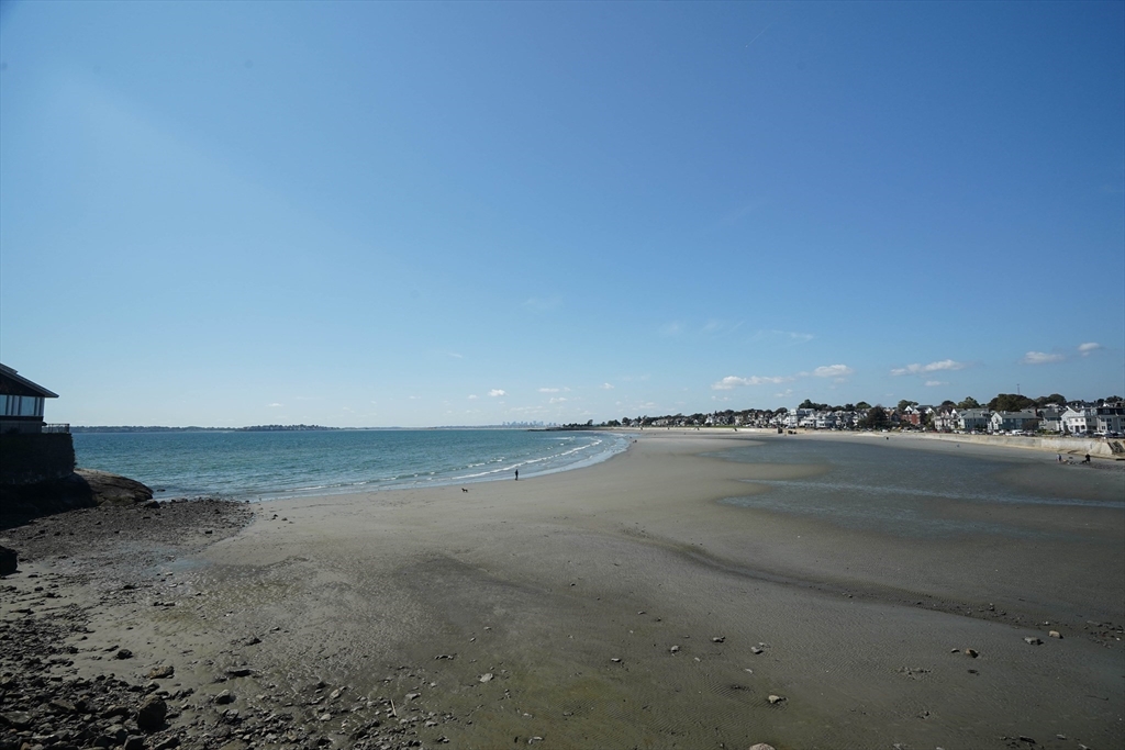 168 Humphrey Street, Unit 2 Swampscott, MA 01907 - Photo 9 of 26 a view of an ocean and beach