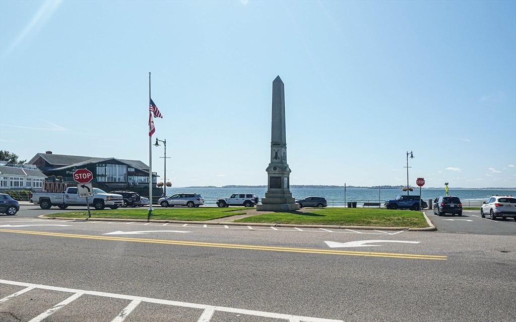 168 Humphrey Street, Unit 2 Swampscott, MA 01907 - Photo 10 of 26 a view of a city with tall buildings