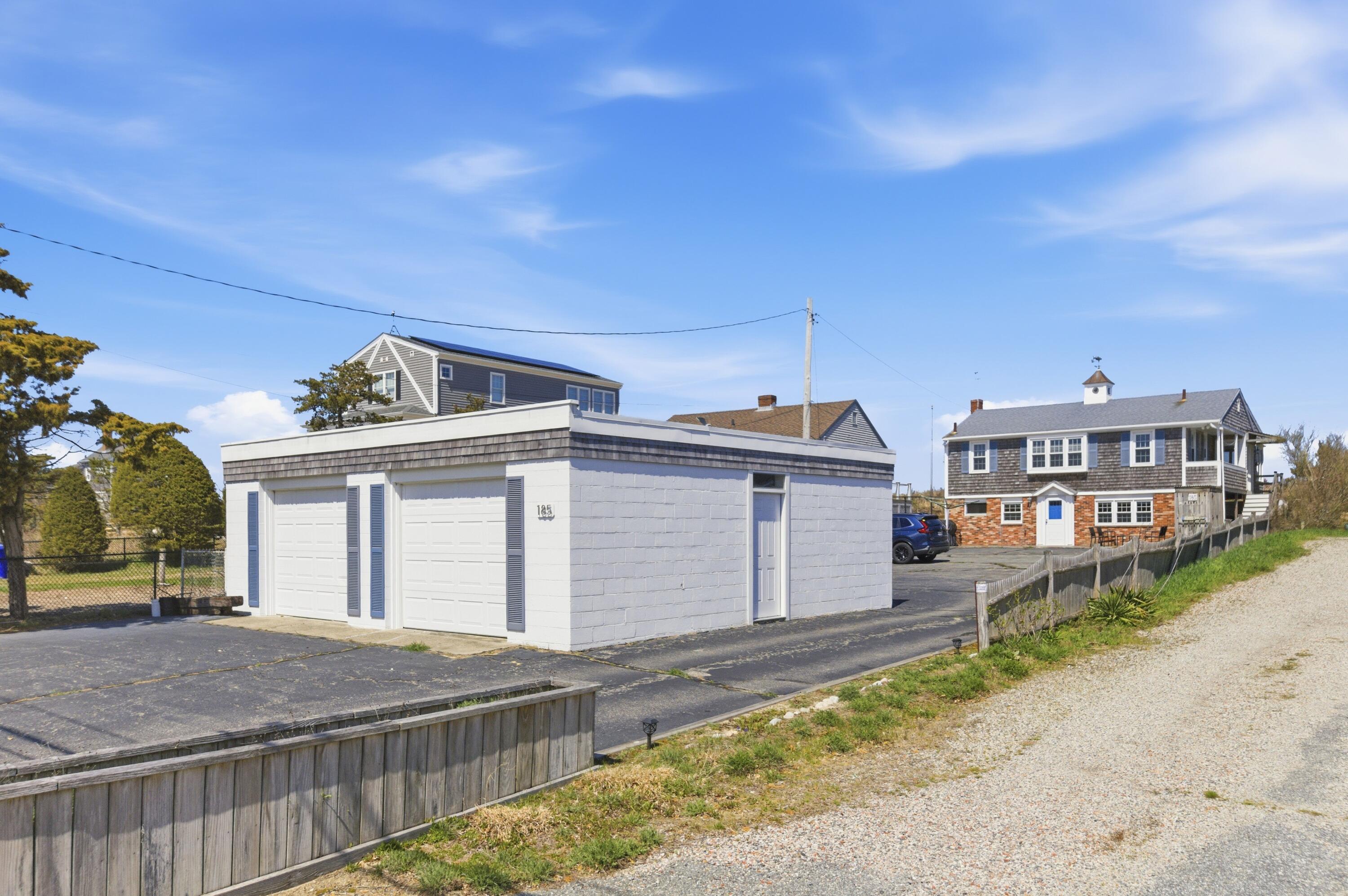 185 Phillips Road Sagamore Beach, MA 02562 - Photo 34 of 37 a view of a house with a outdoor space