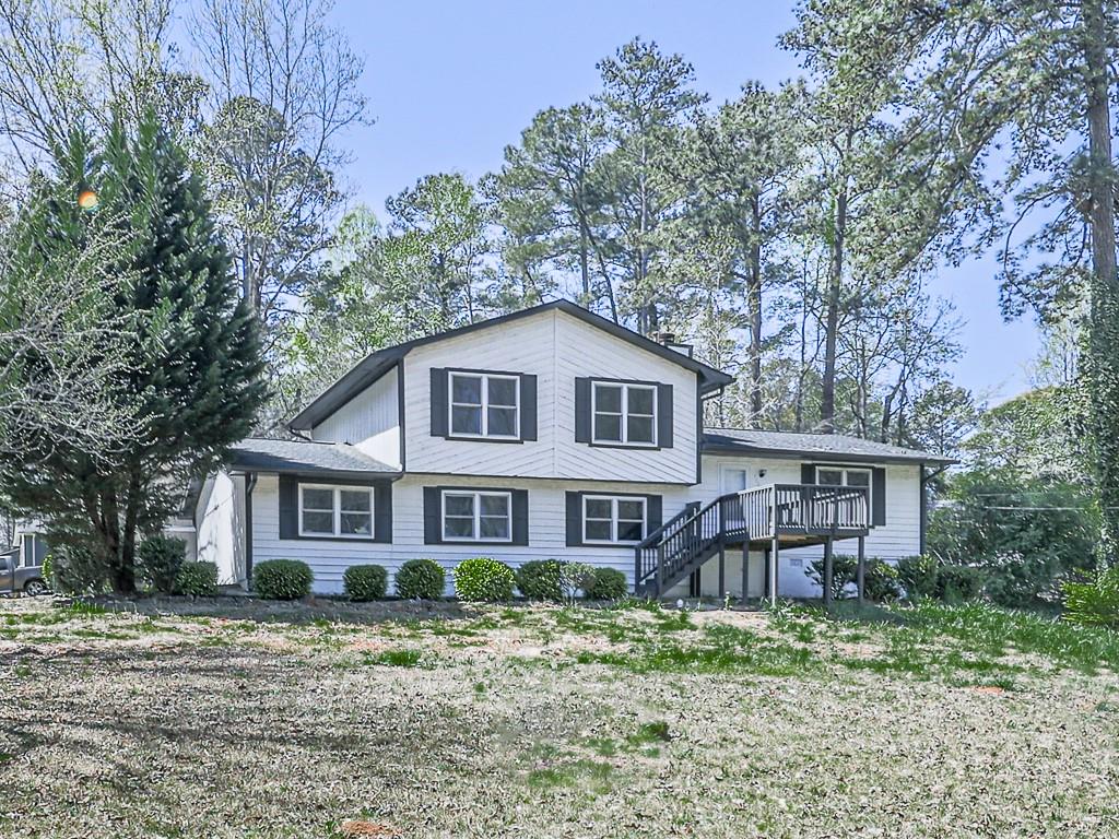3557 Manhattan Drive Decatur, GA 30034 - Photo 1 of 1 a front view of a house with a yard