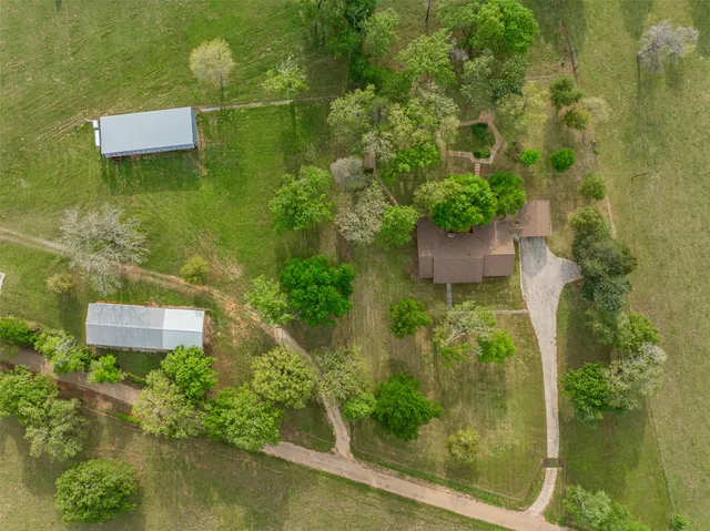 a view of a house with a big yard
