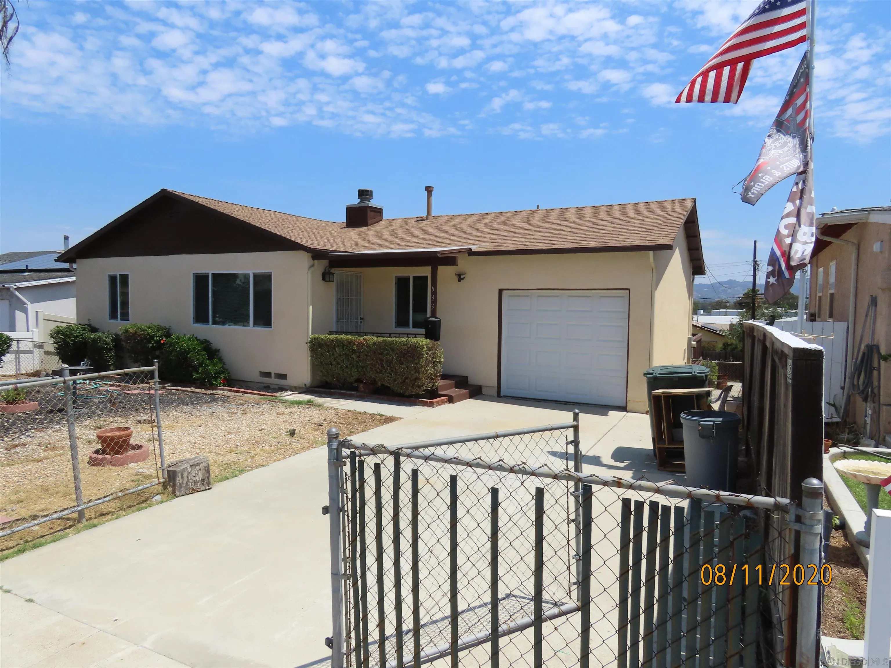 633 El Monte Road El Cajon, CA 92020 - Photo 1 of 18 a view of a house with backyard and sitting area