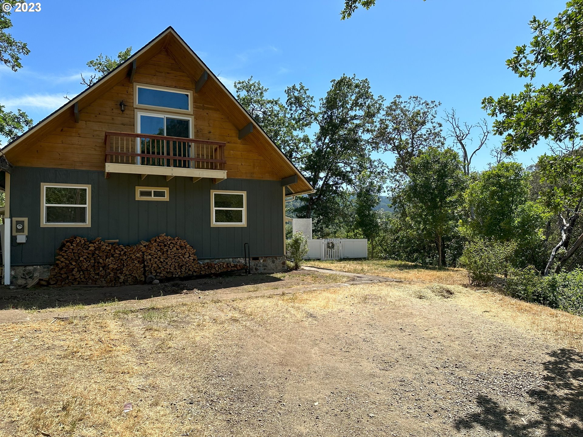 979 Evergreen Ridge Road Riddle, OR 97469 - Photo 36 of 41 a view of backyard of house