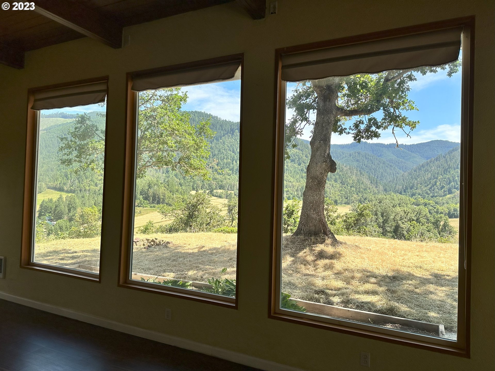 979 Evergreen Ridge Road Riddle, OR 97469 - Photo 5 of 41 a view of window and an empty room