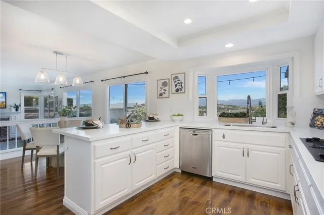 a view of table and chair with potted plant