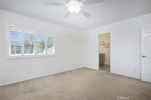 a view of a swimming pool with an outdoor seating