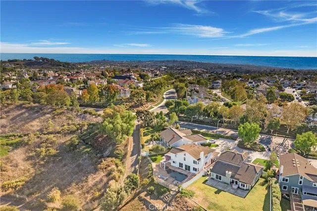 a view of a house with a tub and a potted plant
