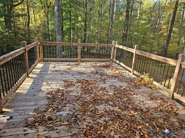 a view of balcony with wooden floor