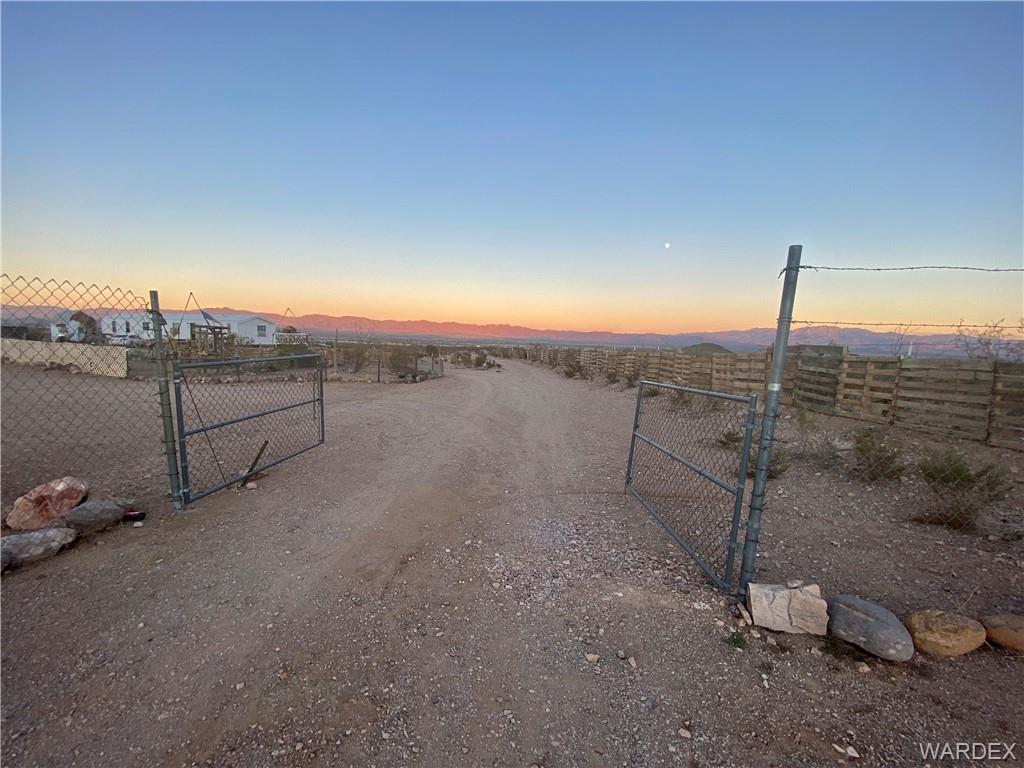 1730 Guthrie Road Golden Valley, AZ 86413 - Photo 3 of 51 a view of a dry yard