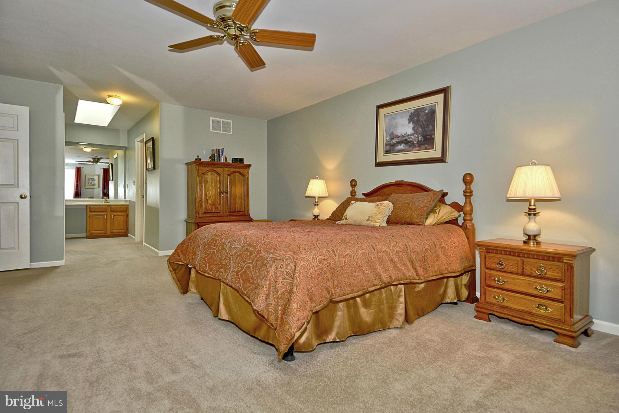 7719 Water Oak Point Road Pasadena, MD 21122 - Photo 13 of 20 Bedroom (Master) w/ceiling fan & walk-in closet