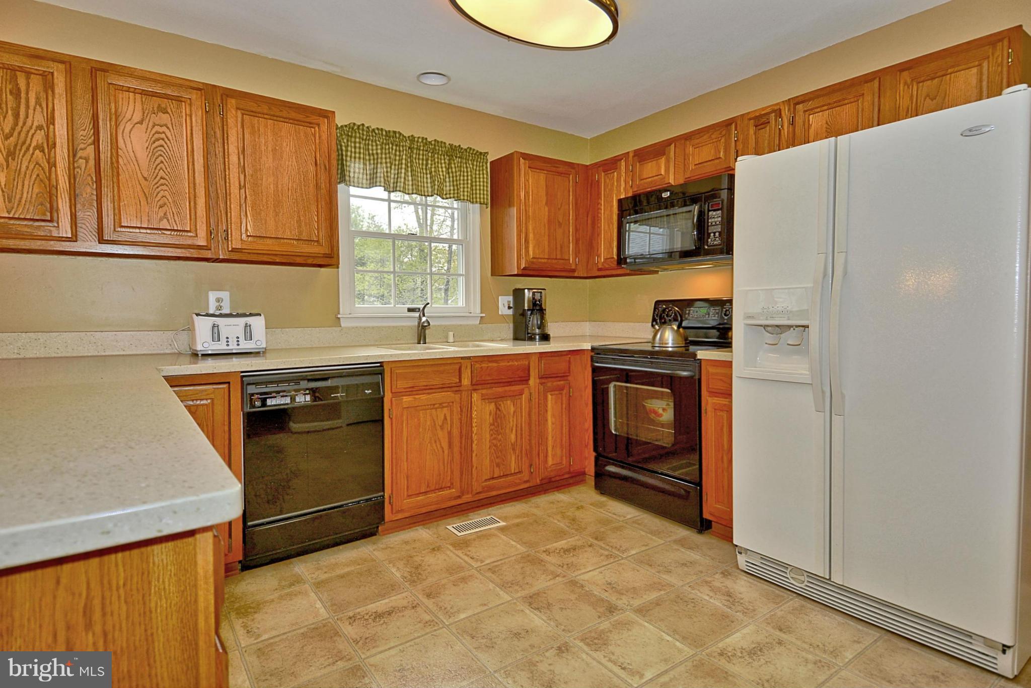 Kitchen w/Corian counters