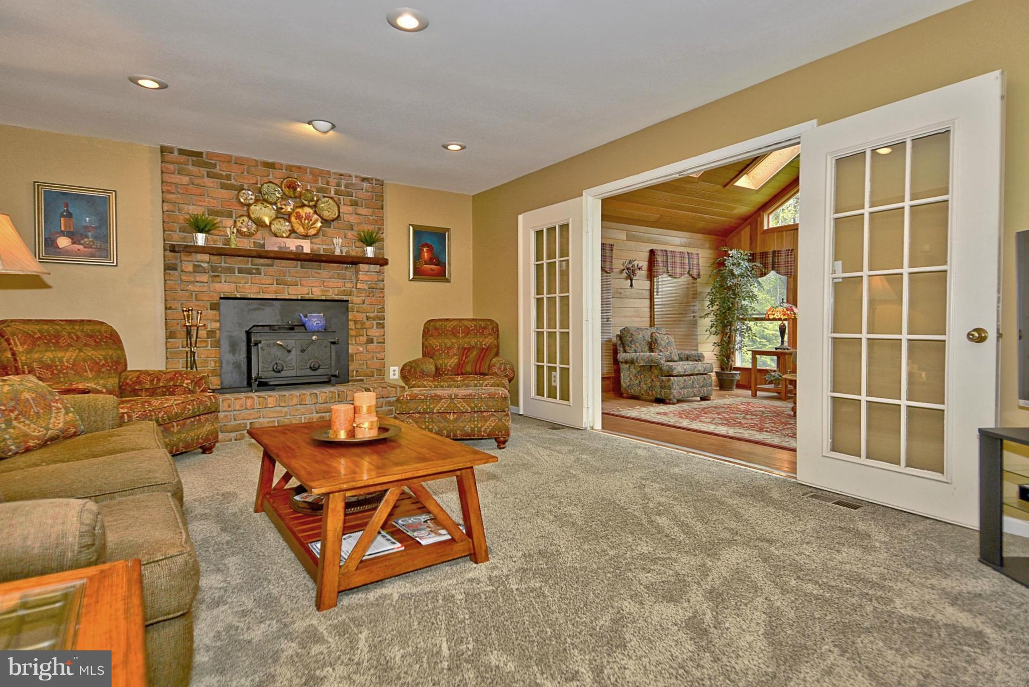 7719 Water Oak Point Road Pasadena, MD 21122 - Photo 8 of 20 Family Room w/woodstove insert.