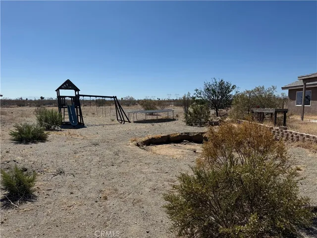 a view of outdoor space with seating area