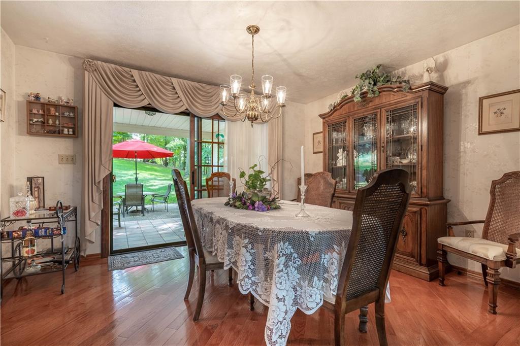 104 Ohare Road Canonsburg, PA 15317 - Photo 10 of 24 dining room with hardwood floors leads out to covered patio