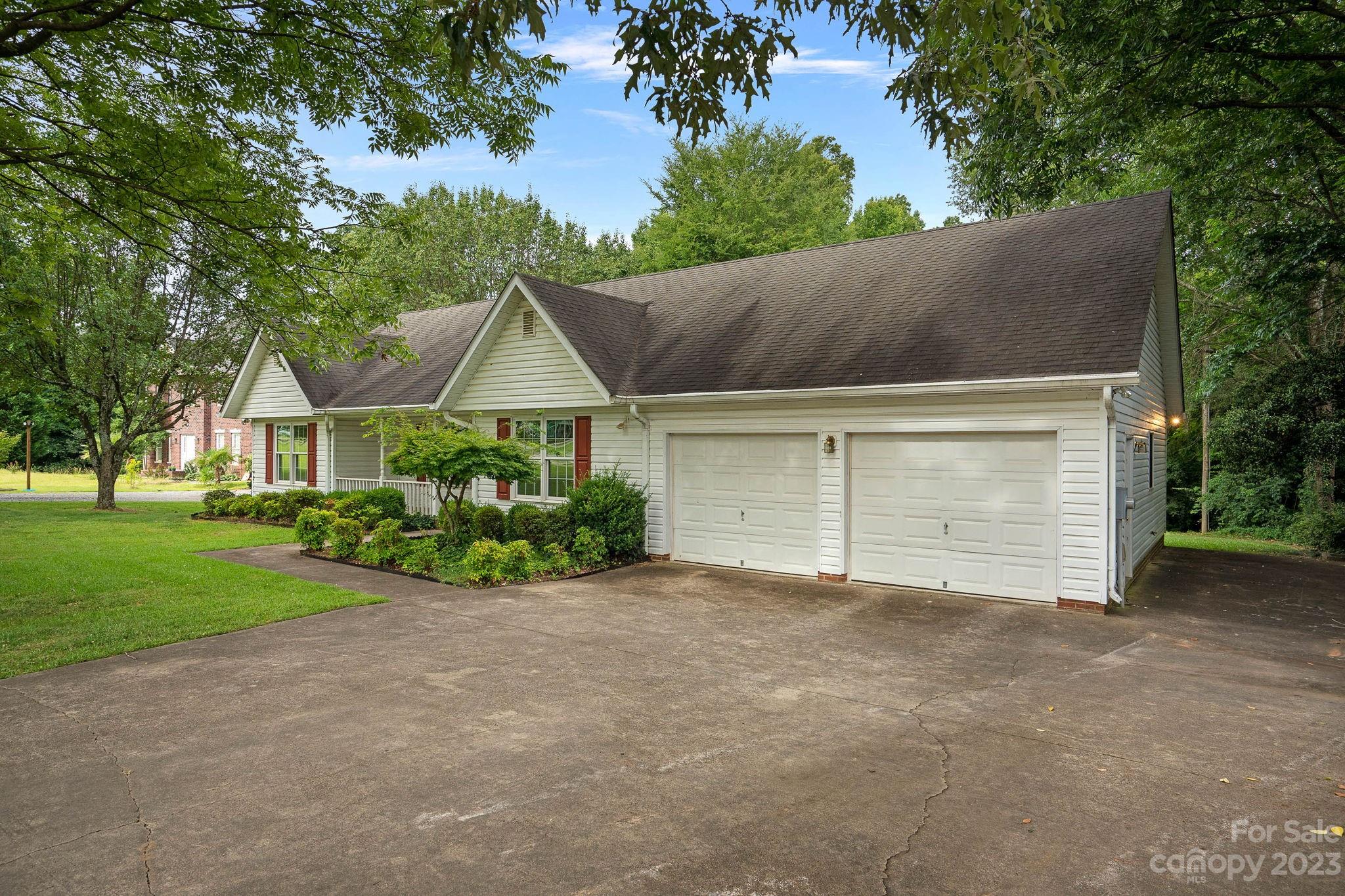 2722 Toddville Road Charlotte, NC 28214 - Photo 28 of 35 a house with a yard