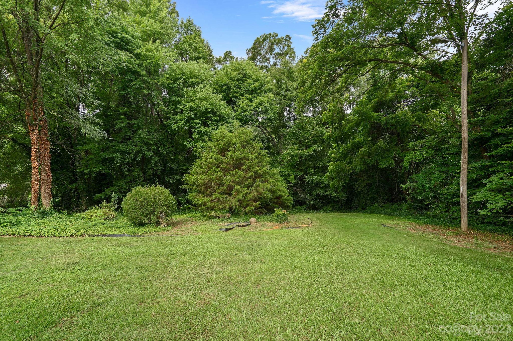 2722 Toddville Road Charlotte, NC 28214 - Photo 35 of 35 a view of a green yard