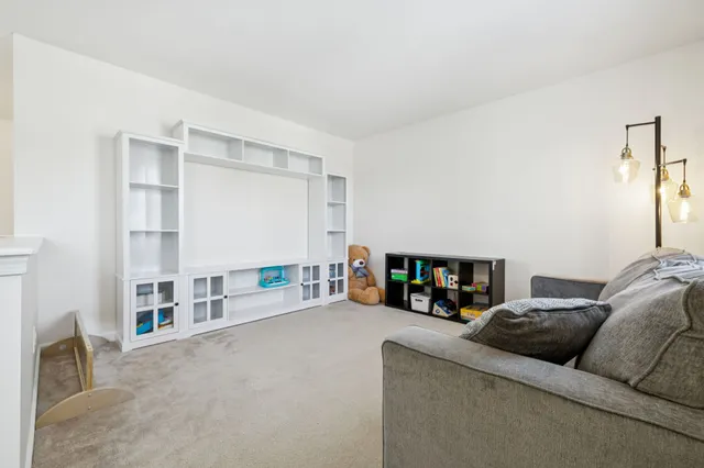 a bedroom with a workspace