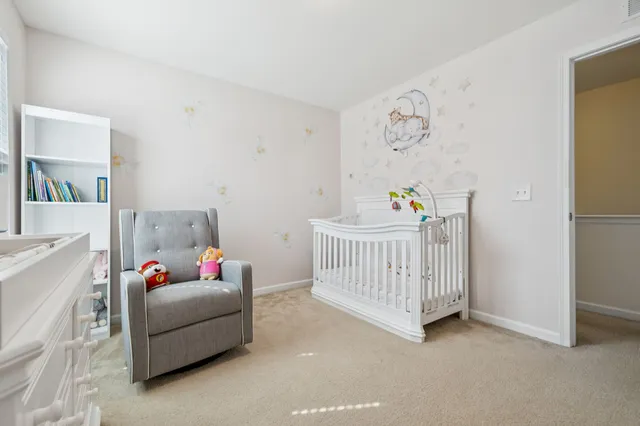 a bathroom with a sink toilet vanity and shower