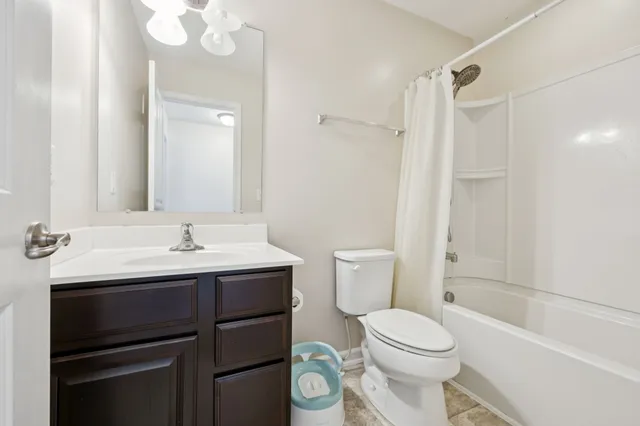 a view of a deck with wooden floor and outdoor seating