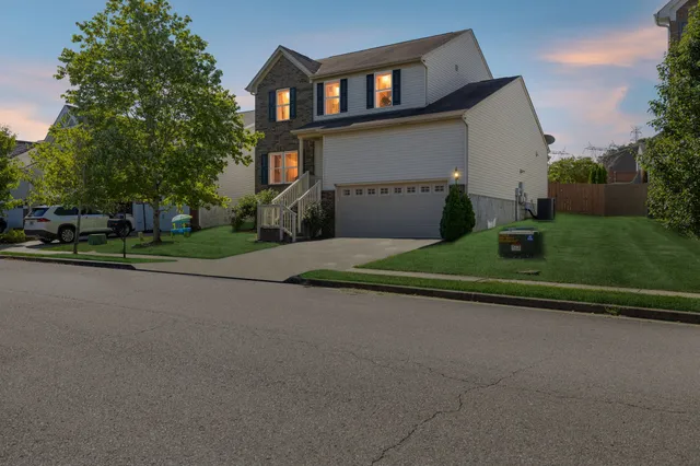 a view of a house with a street