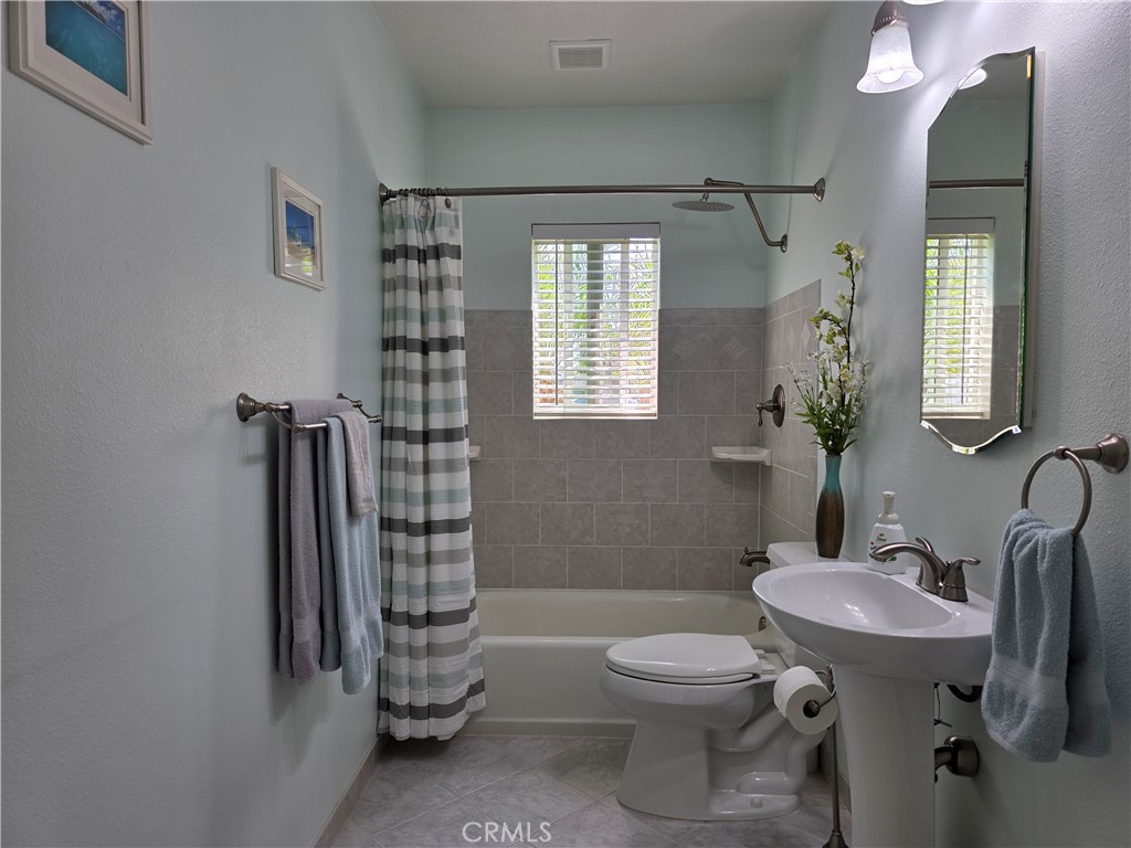 3333 West Keys Lane Anaheim, CA 92804 - Photo 14 of 31 a bathroom with a sink toilet and shower