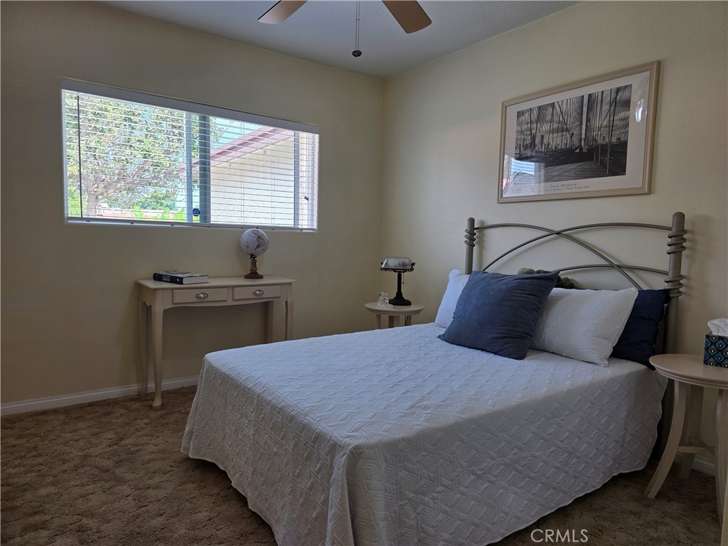3333 West Keys Lane Anaheim, CA 92804 - Photo 15 of 31 a bed sitting in a bedroom next to a window