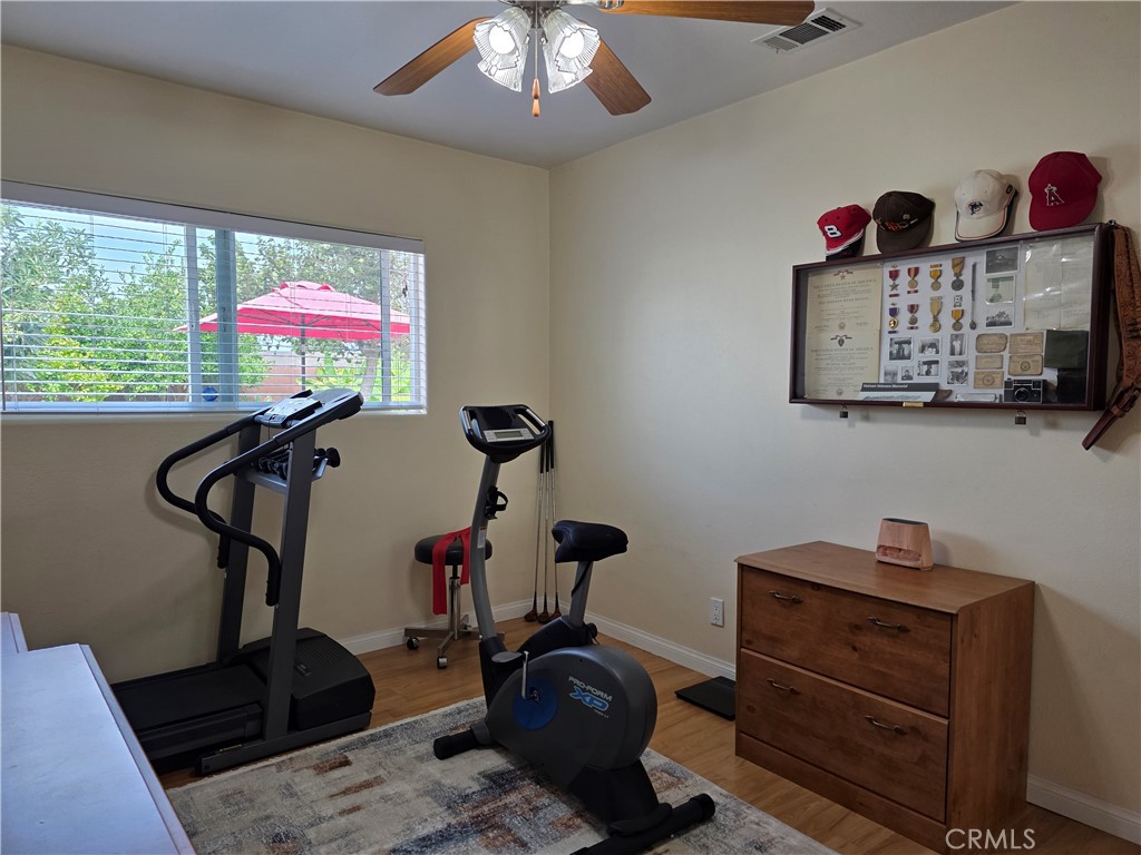 3333 West Keys Lane Anaheim, CA 92804 - Photo 22 of 31 a room with lots of gym equipment
