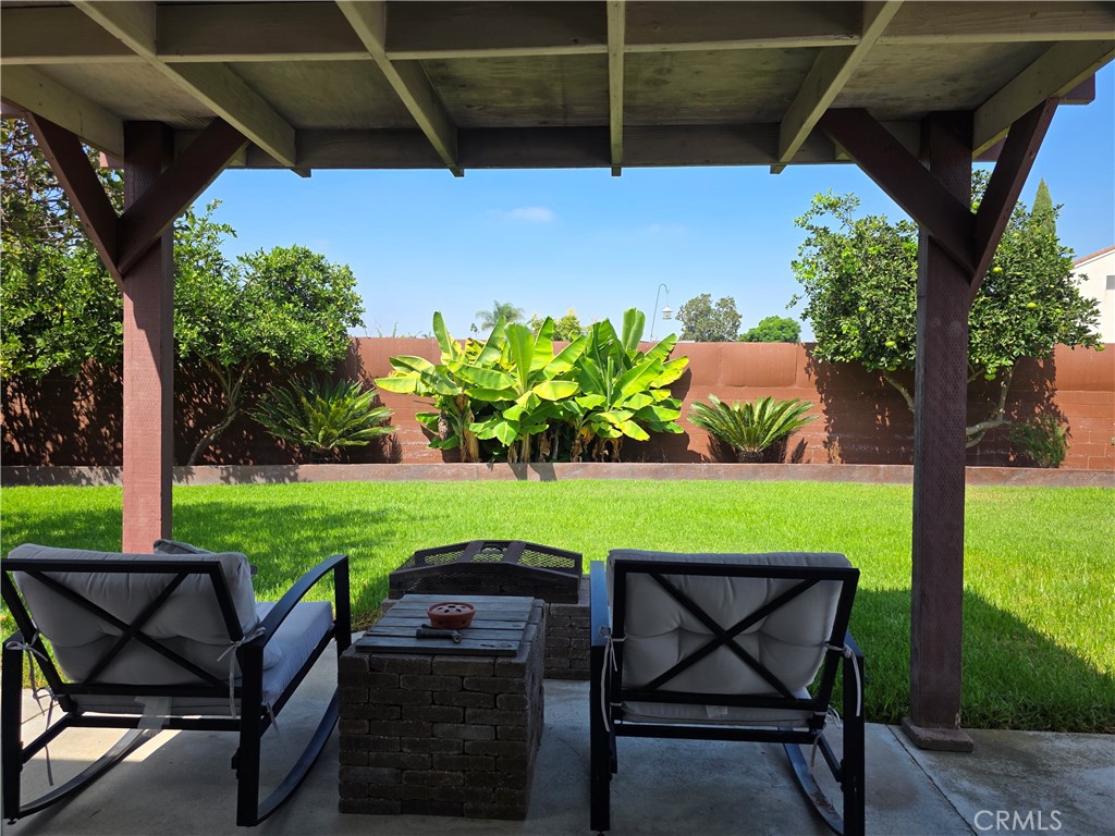 3333 West Keys Lane Anaheim, CA 92804 - Photo 28 of 31 a view of a chairs and table in the garden