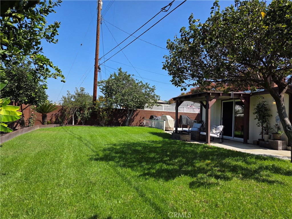 3333 West Keys Lane Anaheim, CA 92804 - Photo 29 of 31 a view of a house with a yard porch and sitting area