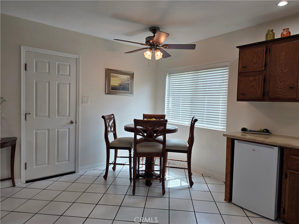 3333 West Keys Lane Anaheim, CA 92804 - Photo 8 of 31 a view of a dining room with furniture and a window