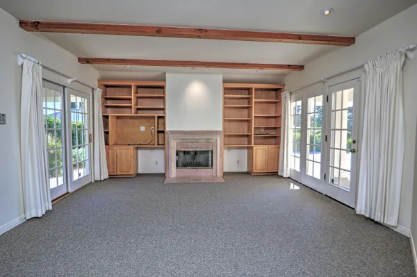 a spacious bathroom with a granite countertop sink toilet and shower
