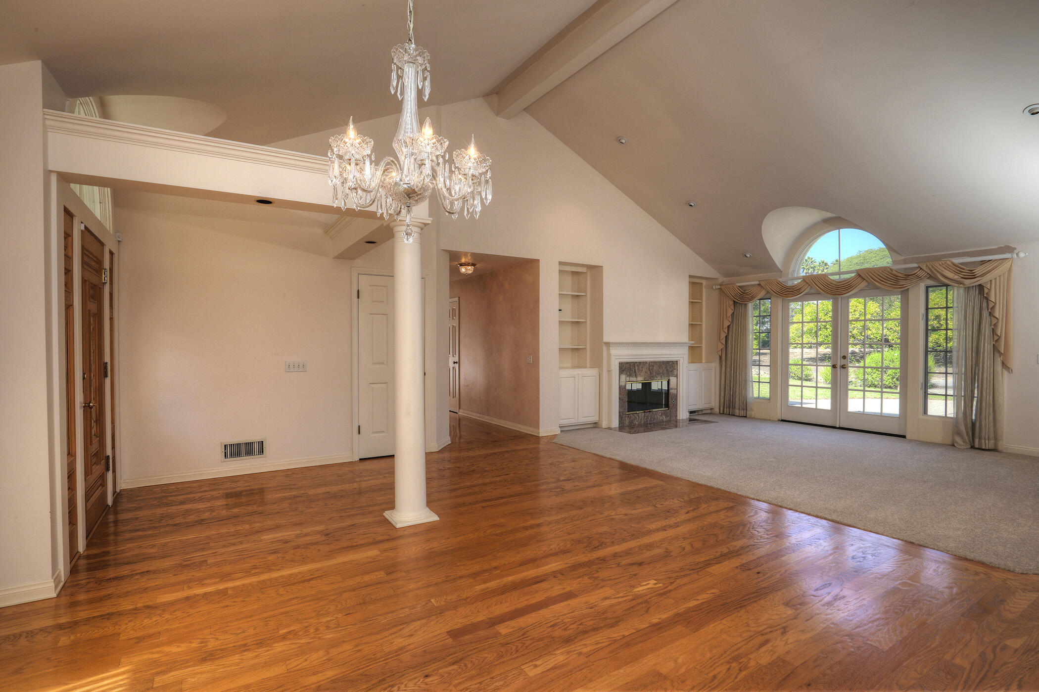 923 Via Los Padres Santa Barbara, CA 93111 - Photo 16 of 36 a view of an empty room with a window and wooden floor