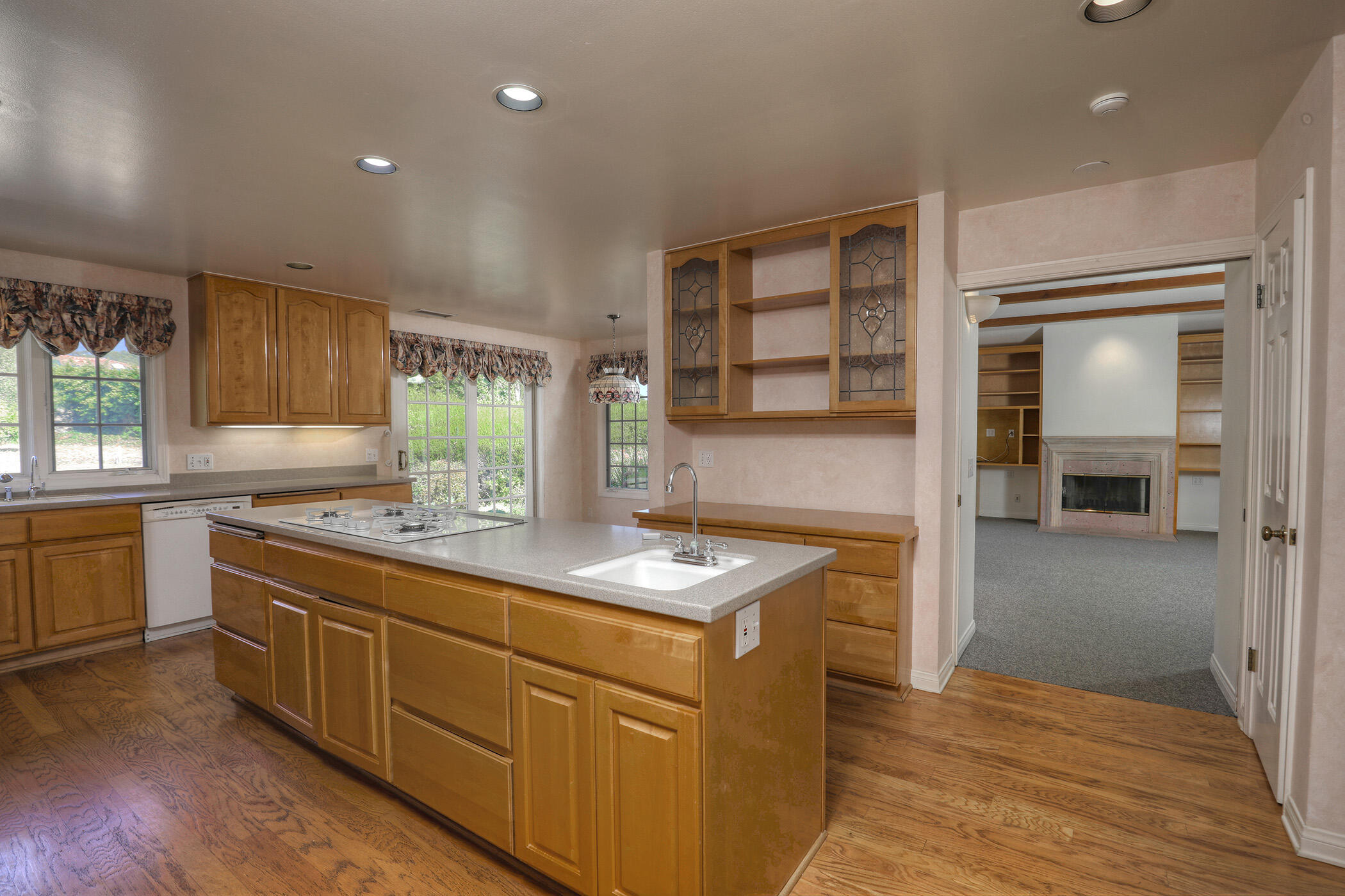 923 Via Los Padres Santa Barbara, CA 93111 - Photo 20 of 36 a kitchen with stainless steel appliances granite countertop a sink stove and cabinets