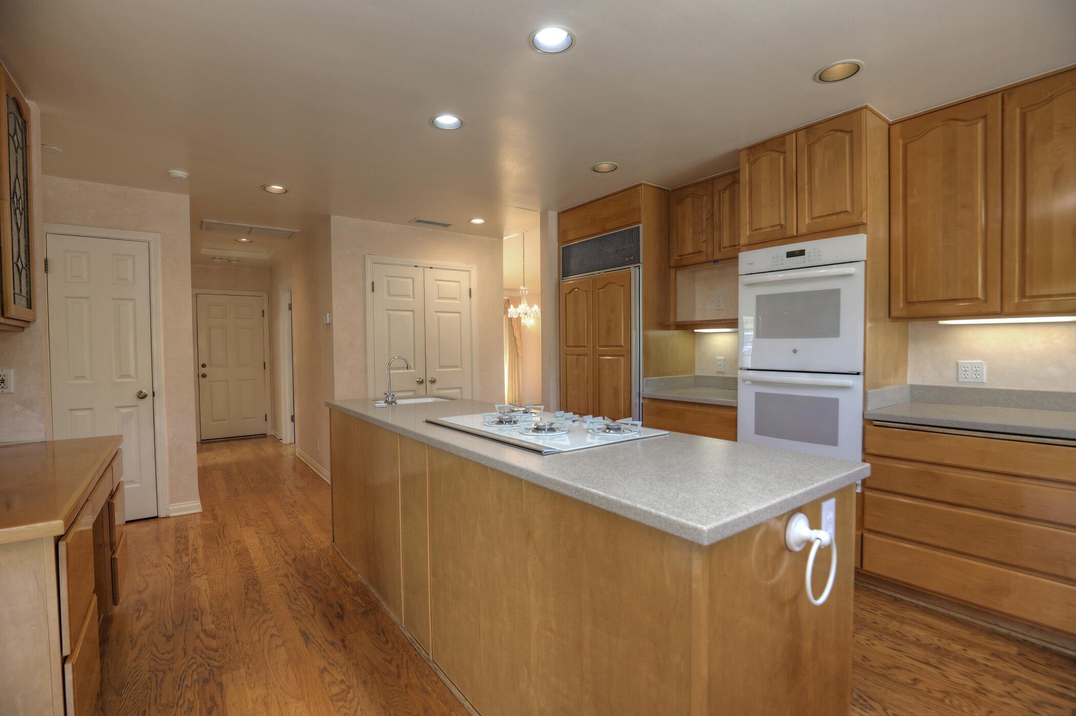 923 Via Los Padres Santa Barbara, CA 93111 - Photo 24 of 36 a kitchen with kitchen island a sink stove and refrigerator