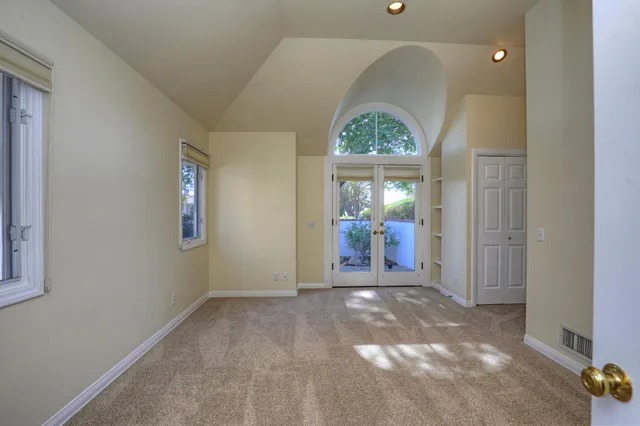a view of a bathroom from a hallway