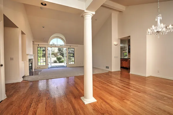 a view of empty room with front door