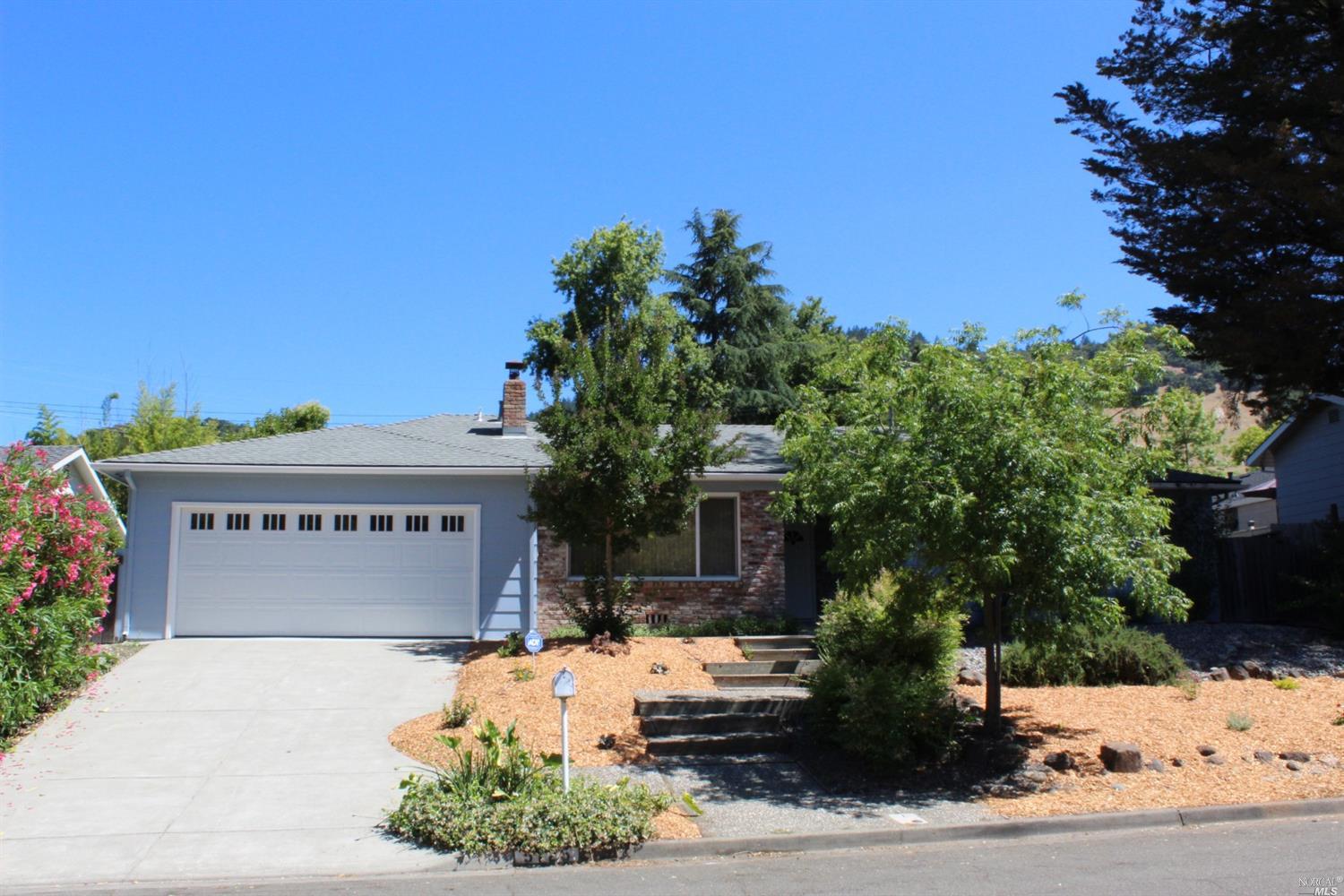 5725 Monte Verde Drive Santa Rosa, CA 95409 - Photo 1 of 1 a front view of a building with garden