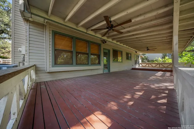 a view of an empty room with a balcony