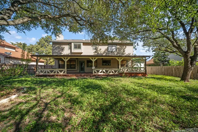front view of a house with a big yard