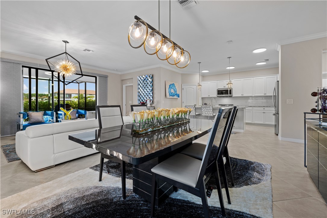 12000 Arbor Trace Drive Fort Myers, FL 33913 - Photo 17 of 50 a view of a dining room with furniture