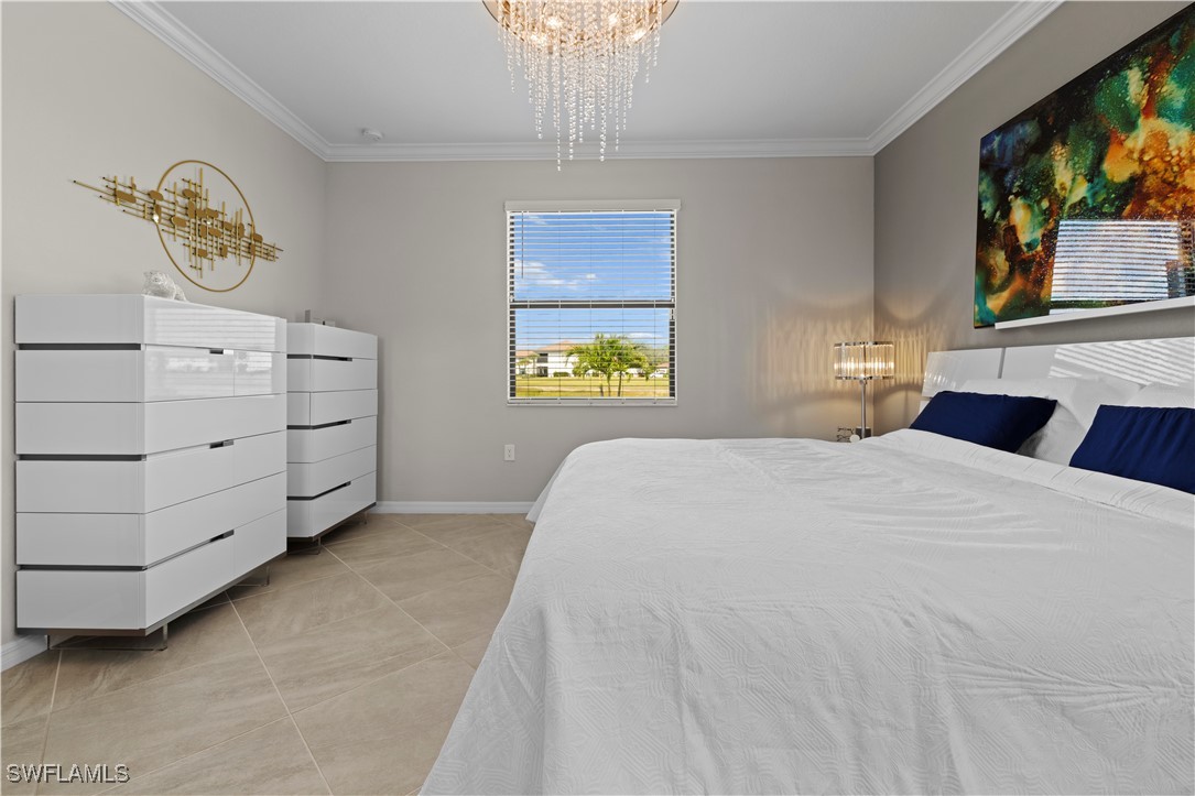 12000 Arbor Trace Drive Fort Myers, FL 33913 - Photo 20 of 50 a bedroom with a bed and a painting on the wall