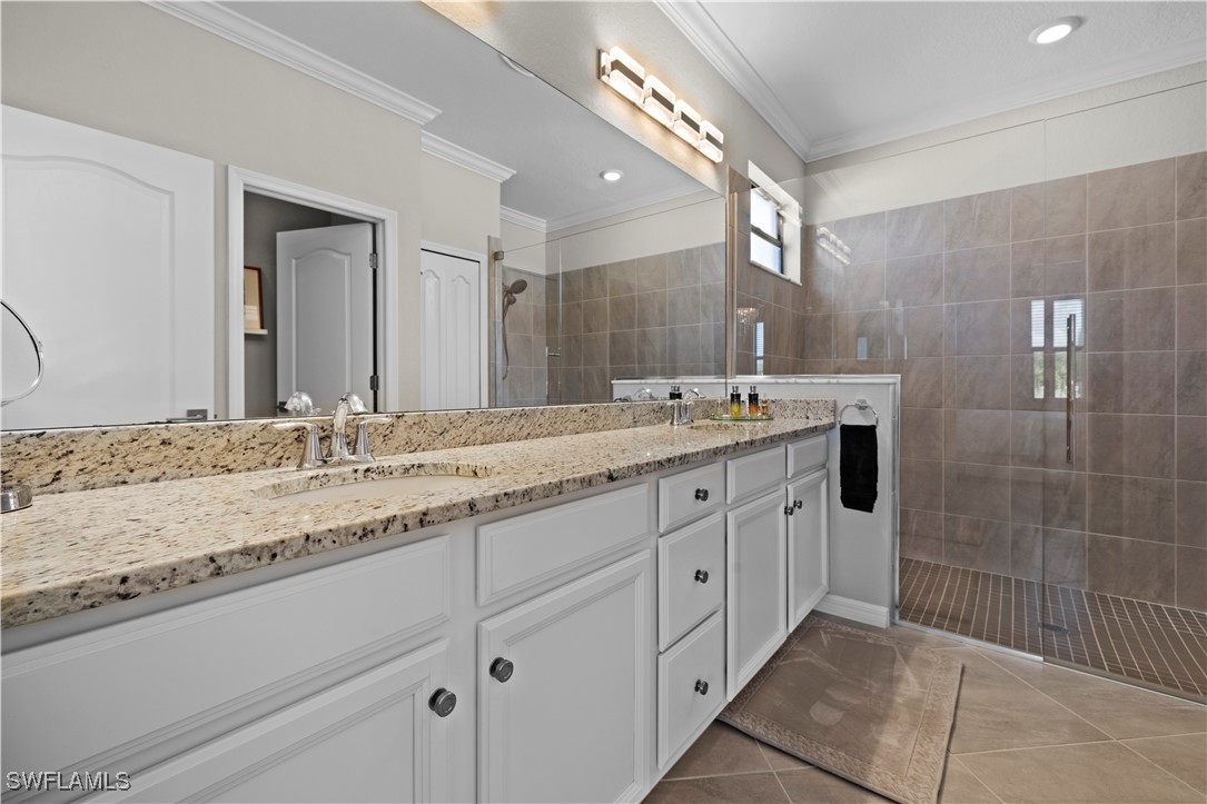 12000 Arbor Trace Drive Fort Myers, FL 33913 - Photo 23 of 50 a bathroom with a granite countertop sink mirror and double