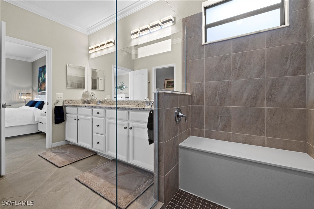 12000 Arbor Trace Drive Fort Myers, FL 33913 - Photo 25 of 50 a bathroom with a sink a toilet a mirror and shower
