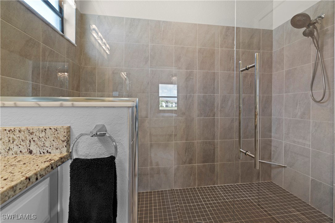 12000 Arbor Trace Drive Fort Myers, FL 33913 - Photo 26 of 50 a bathroom with a shower