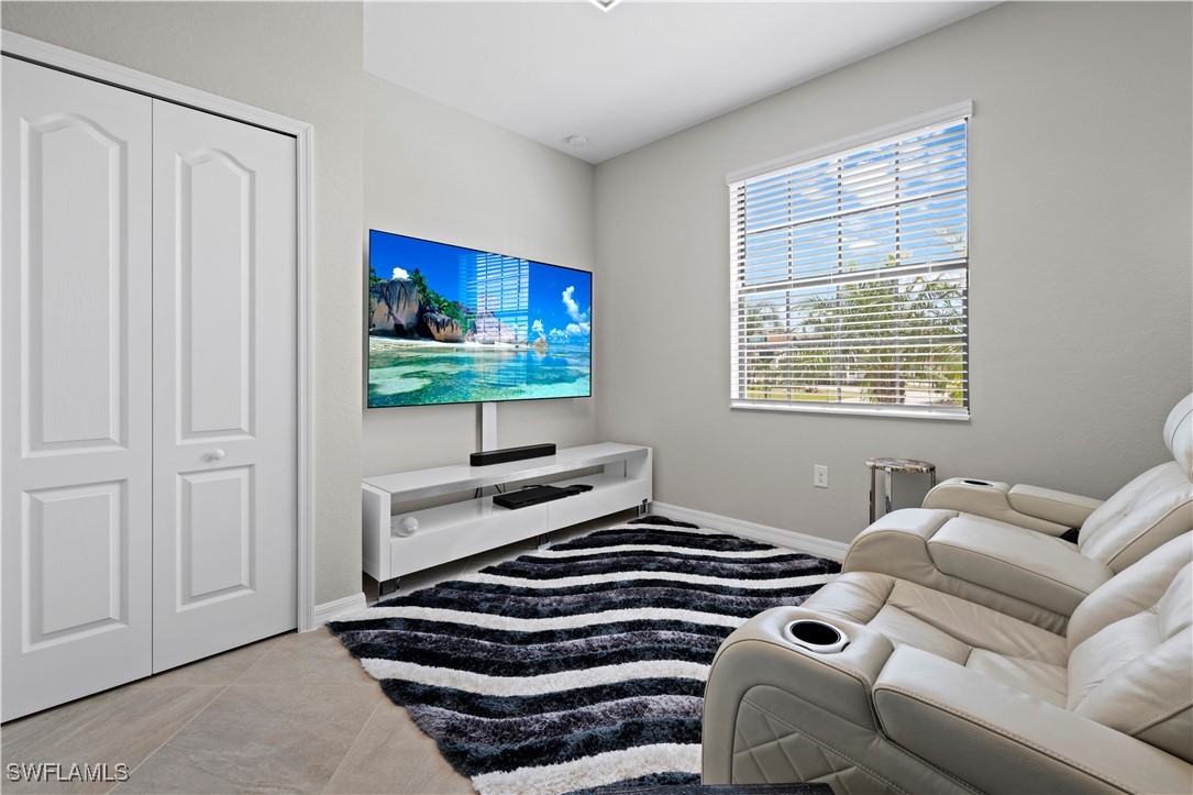 12000 Arbor Trace Drive Fort Myers, FL 33913 - Photo 28 of 50 a bedroom with furniture and a window