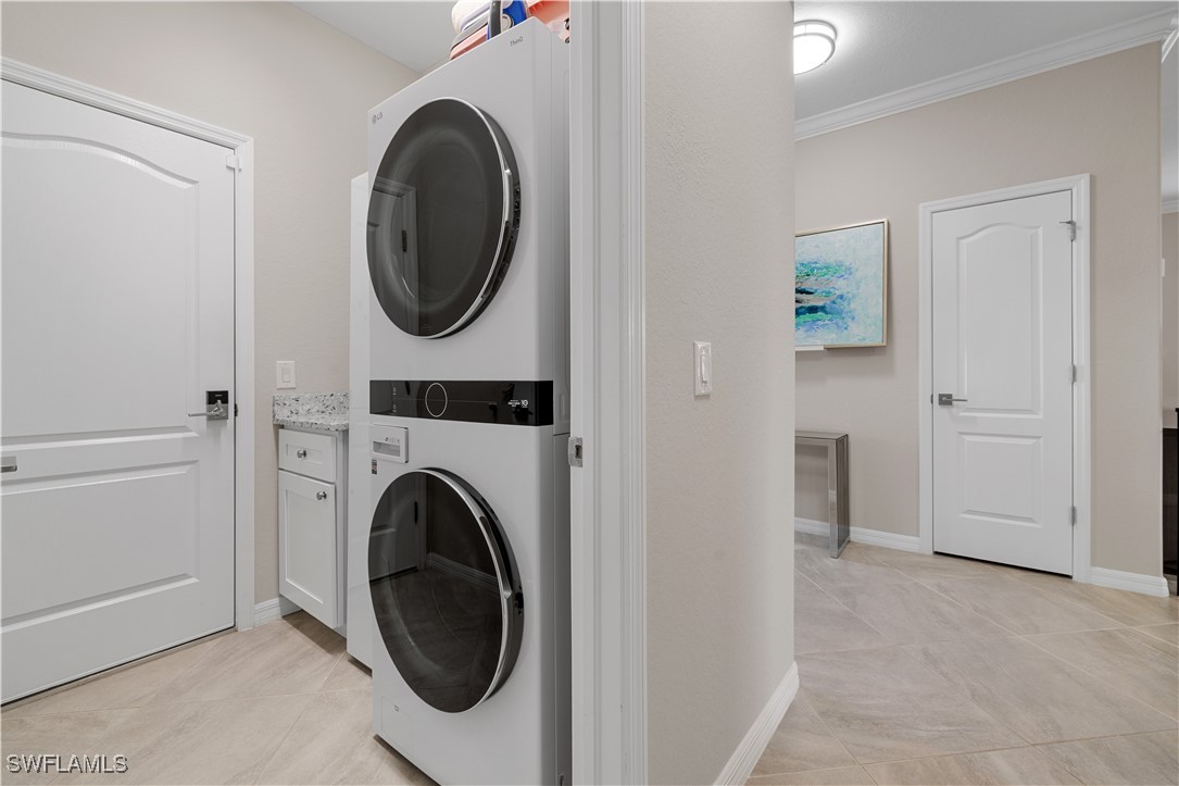 12000 Arbor Trace Drive Fort Myers, FL 33913 - Photo 36 of 50 a utility room with dryer and washer